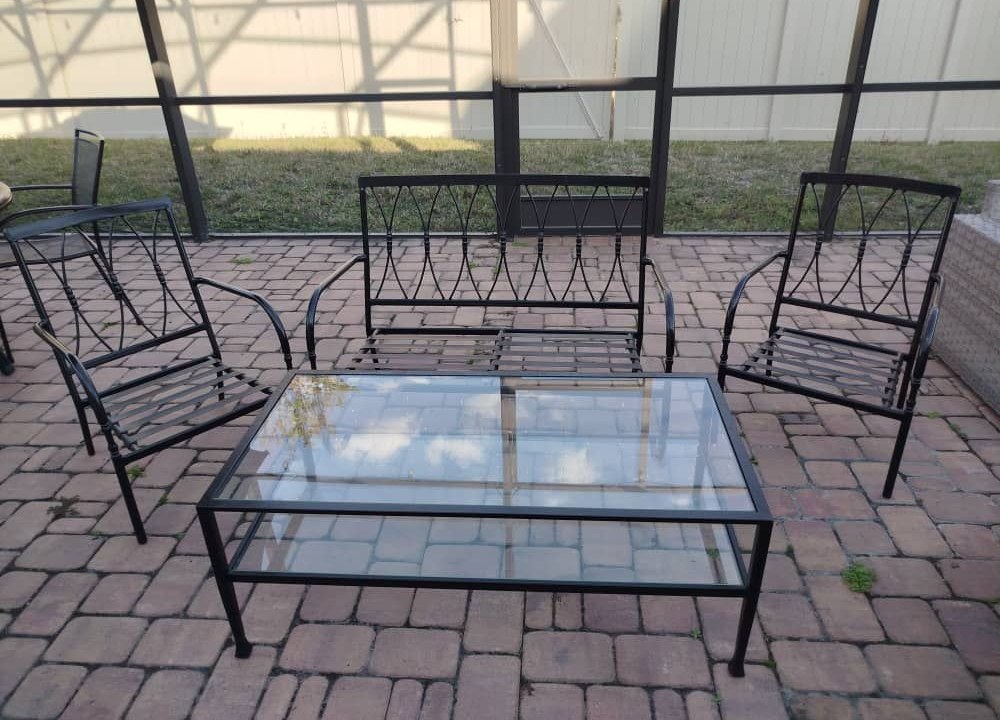 Restored wrought-iron patio furniture set